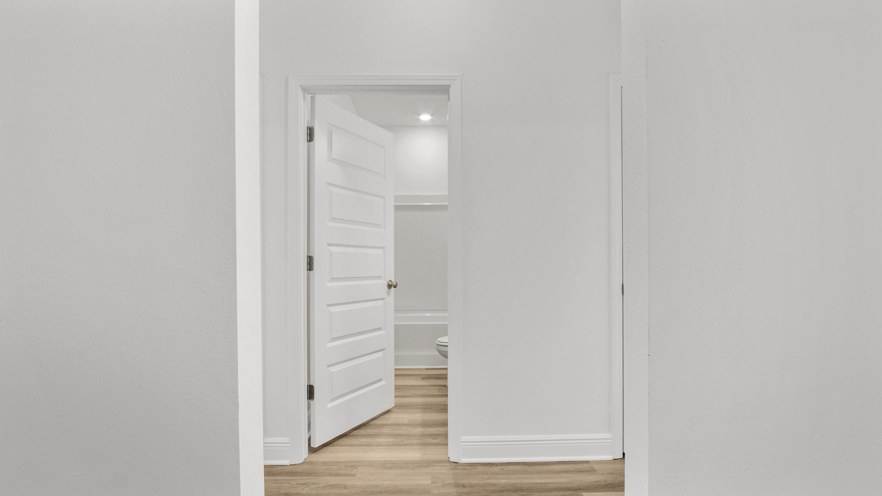 39 Gray Owl Drive Freeport, FL 32439 - Photo 19 of 31 a view of a hallway with wooden floor