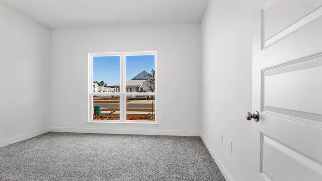 a view of an empty room and window