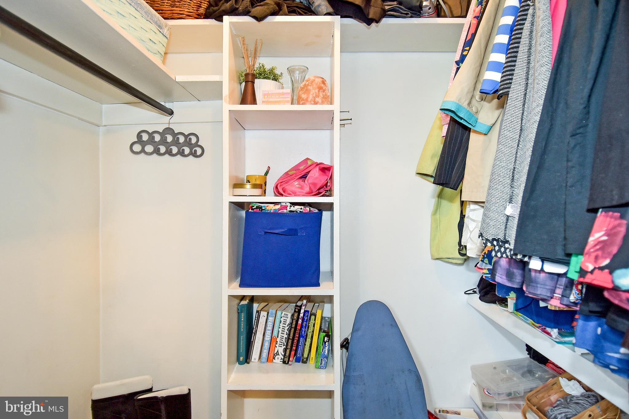 1024 Grovehill Road Baltimore, MD 21227 - Photo 20 of 39 a bedroom with furniture and a book shelf