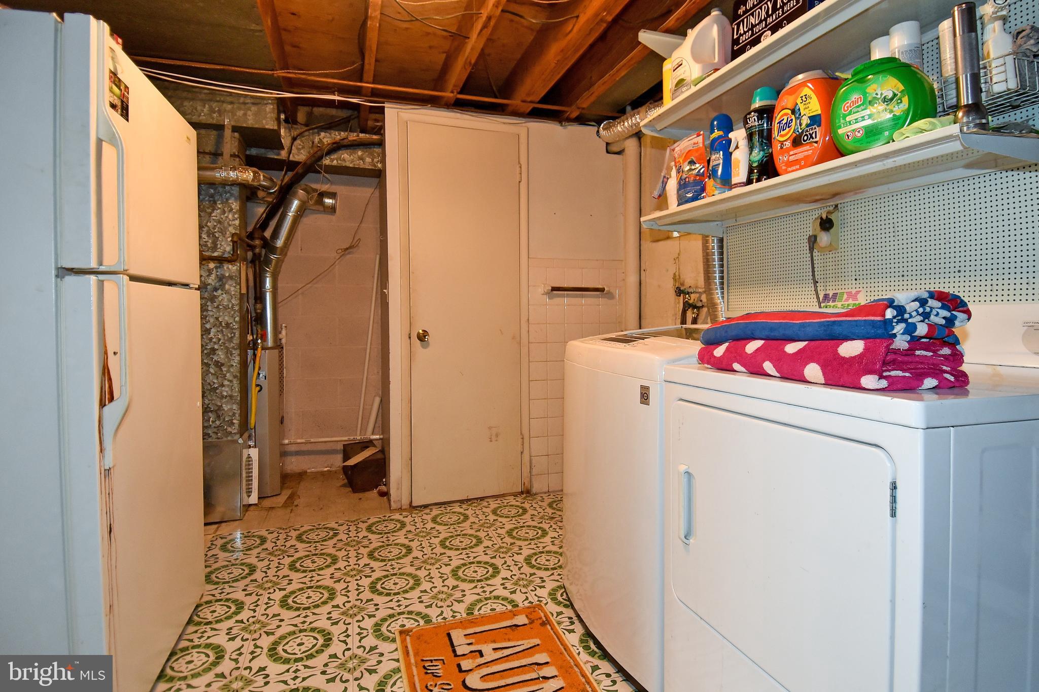1024 Grovehill Road Baltimore, MD 21227 - Photo 29 of 39 a utility room with dryer and washer