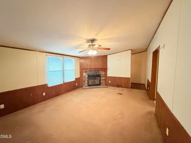 a view of a livingroom with a furniture