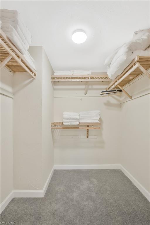 1039 Cardinal Street Naples, FL 34104 - Photo 19 of 29 a view of an empty walk in closet