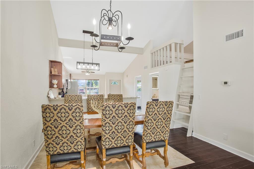 1039 Cardinal Street Naples, FL 34104 - Photo 10 of 29 a view of a dining room with furniture