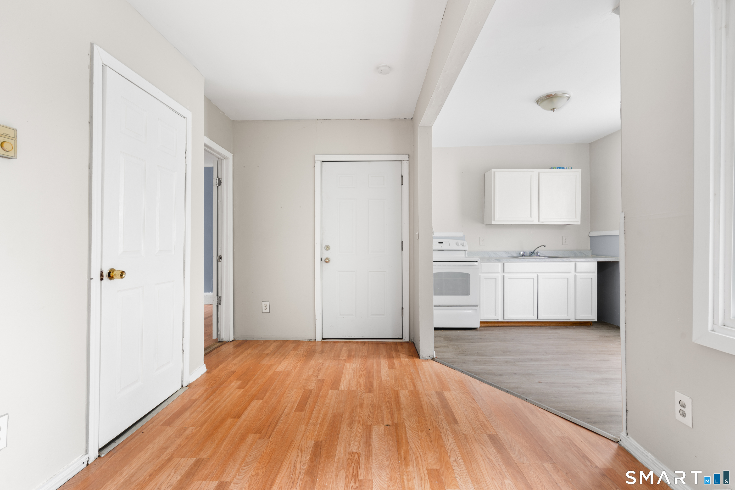 135 Prospect Street Waterbury, CT 06710 - Photo 12 of 19 a view of a kitchen with wooden floor