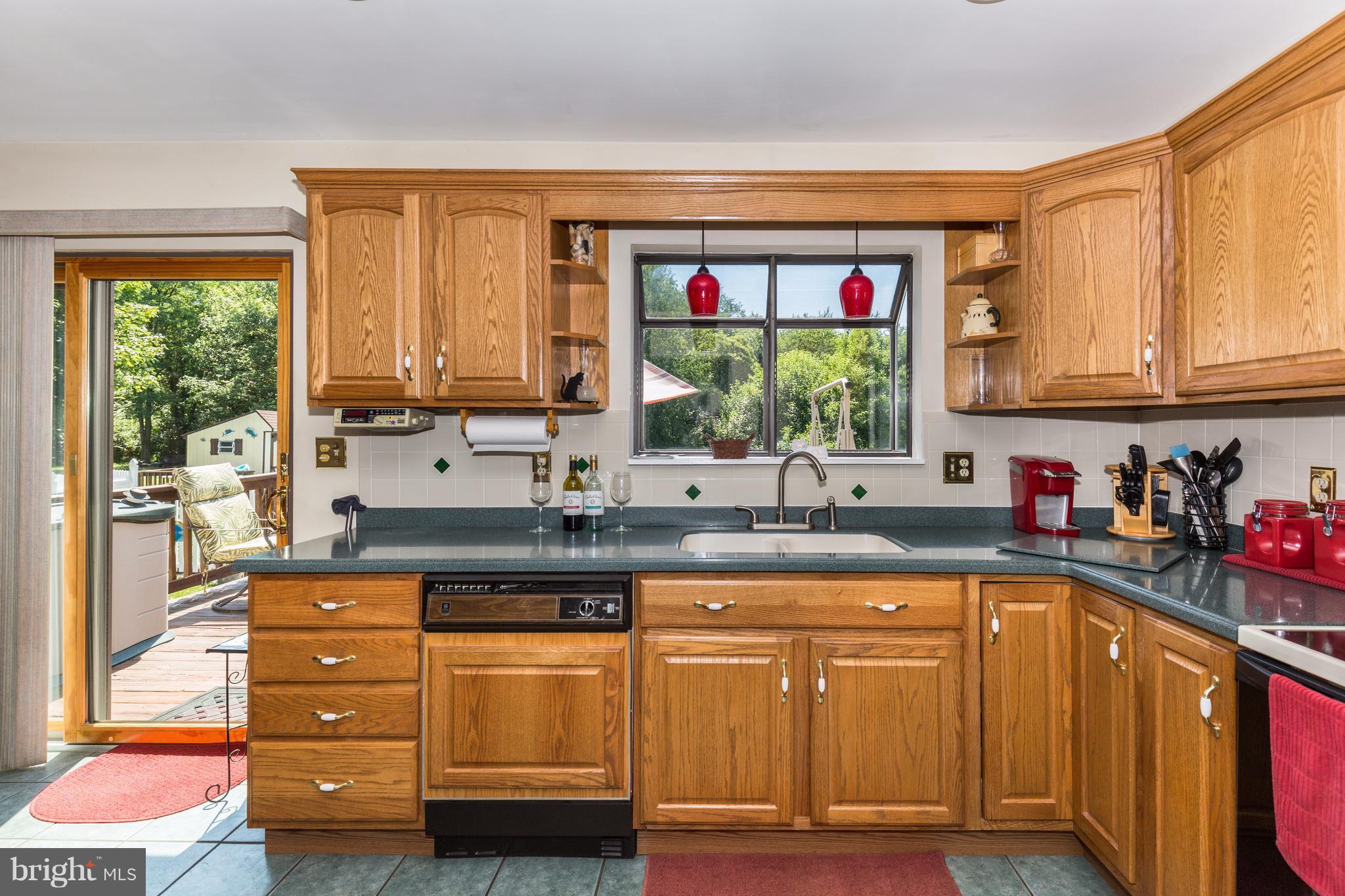 1307 Stone Road Westminster, MD 21158 - Photo 15 of 30 Kitchen with all appliances and slider to deck