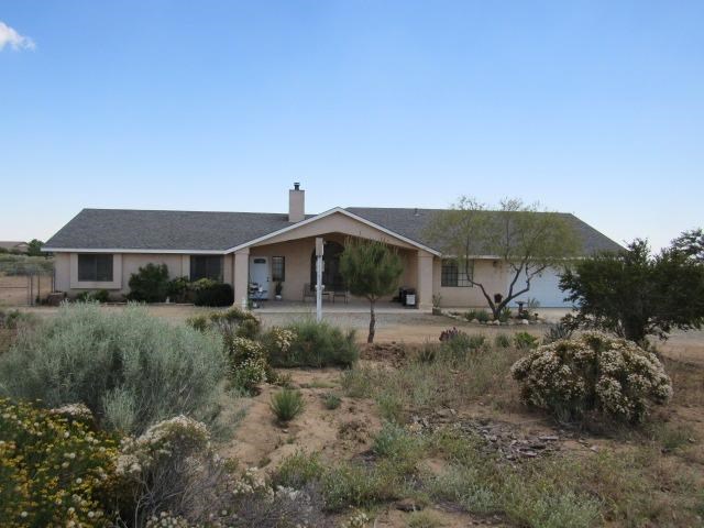 8736 Riggins Road Phelan, CA 92371 - Photo 1 of 1 a house view with a garden