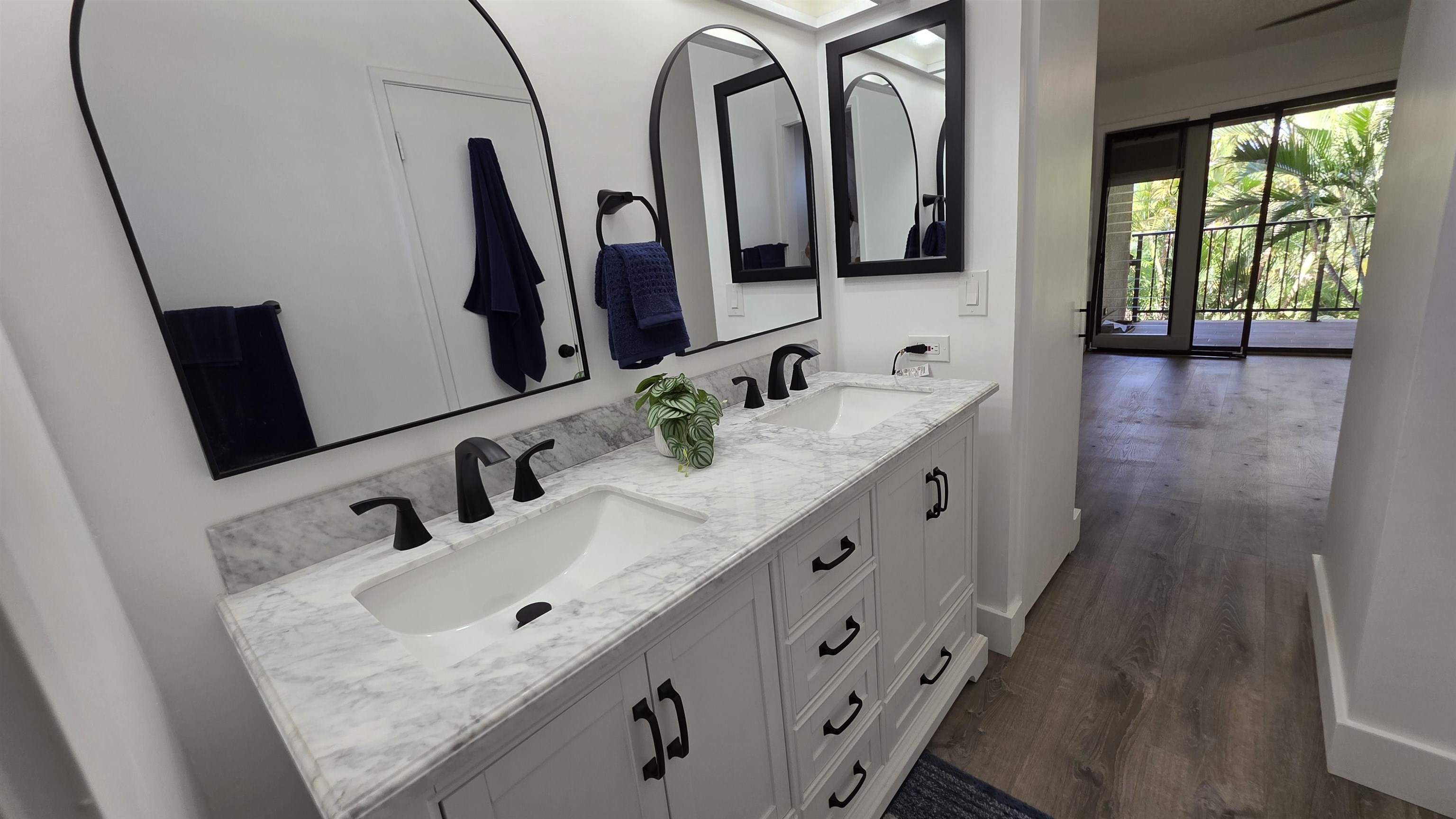 3788 Lower Honoapiilani Road, Unit A210 Lahaina, HI 96761 - Photo 21 of 21 a bathroom with double vanity and a mirror
