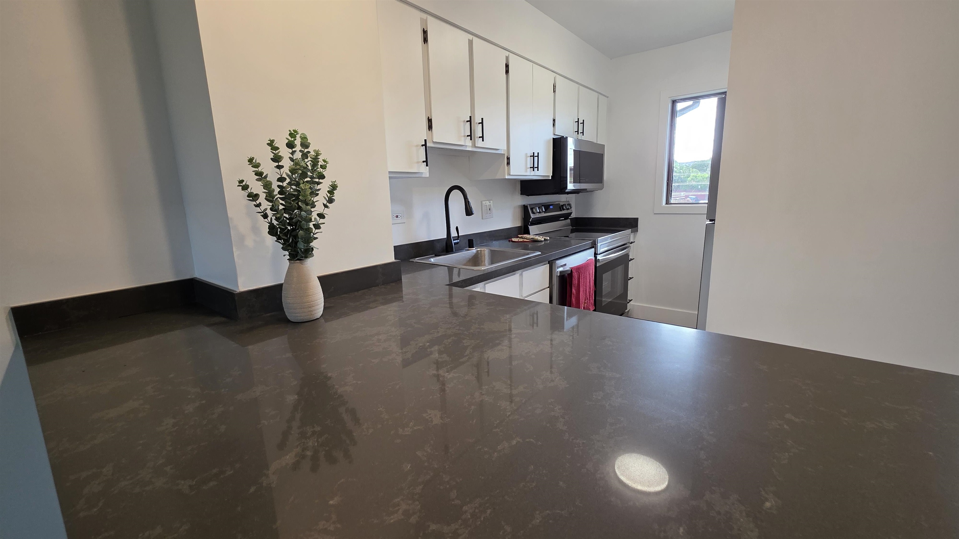 3788 Lower Honoapiilani Road, Unit A210 Lahaina, HI 96761 - Photo 9 of 21 a view of storage and utility room with a window