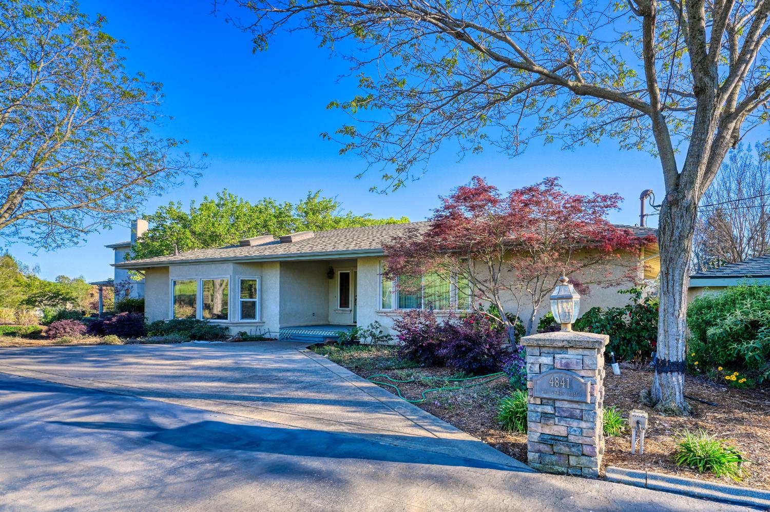 4841 Val Verde Road Loomis, CA 95650 - Photo 44 of 99 a front view of a house with a yard