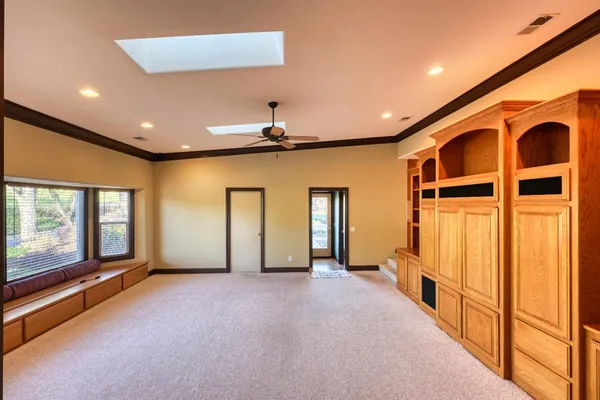 a kitchen with stainless steel appliances granite countertop a sink stove and granite counter top