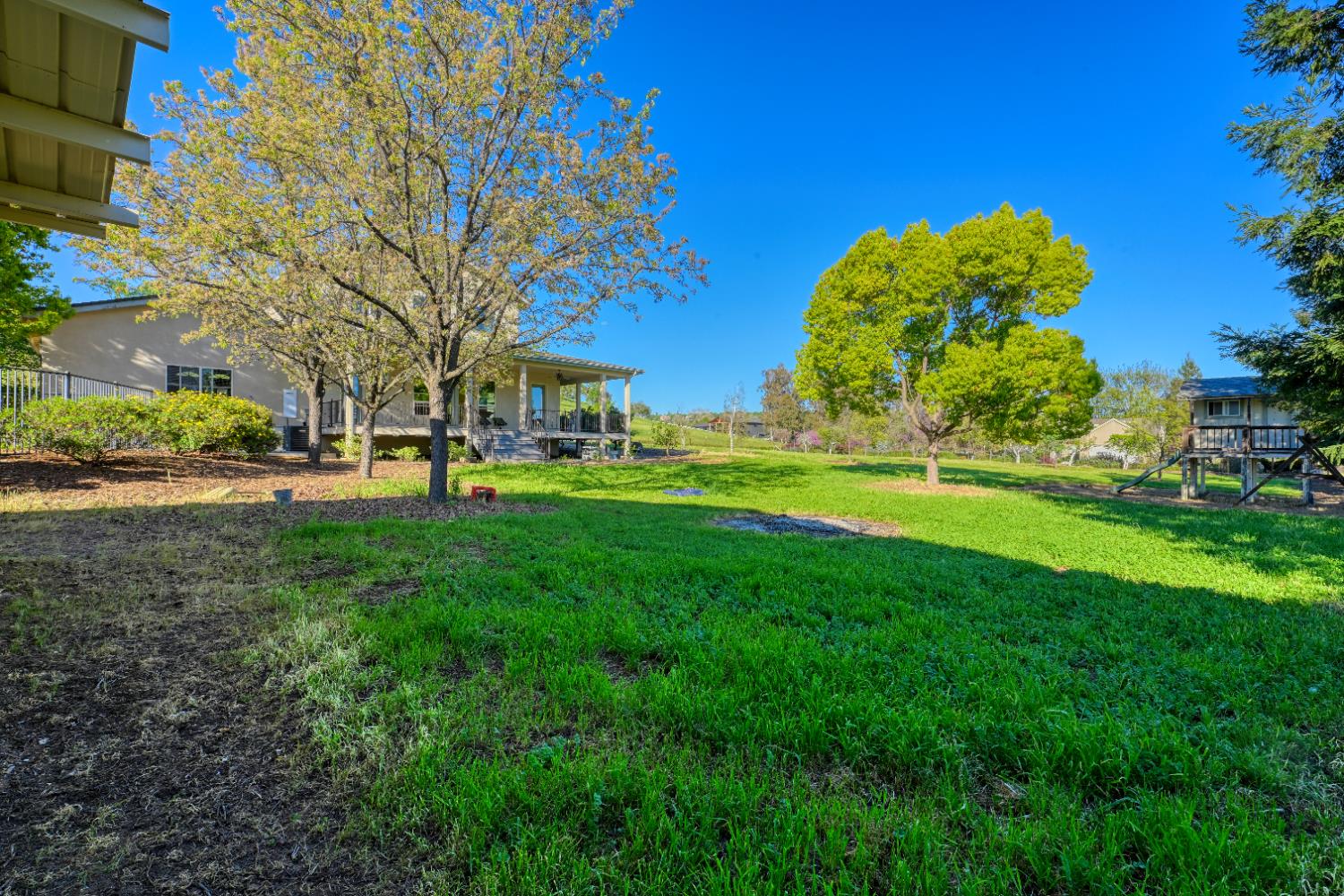 4841 Val Verde Road Loomis, CA 95650 - Photo 86 of 99 a view of a building and trees in the background