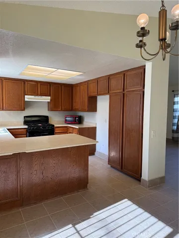 a view of storage and utility room with washer and dryer