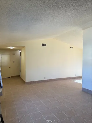a kitchen with stainless steel appliances granite countertop a stove and a sink