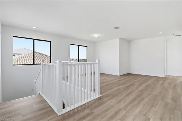 a bathroom with a sink toilet and a mirror