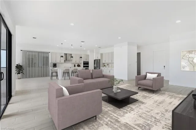 a living room with furniture and a table