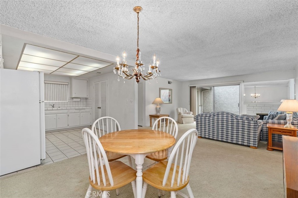 5081 Blackpool Road Westminster, CA 92683 - Photo 12 of 45 a view of a dining room with furniture