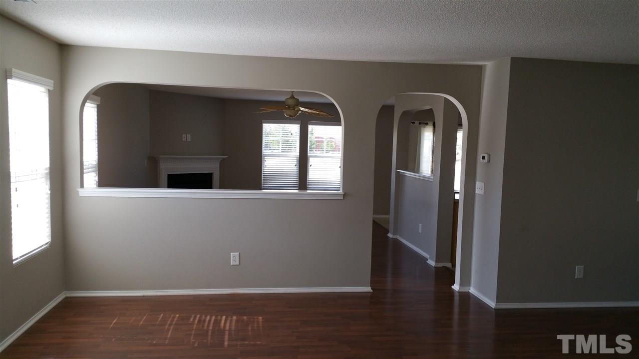1004 Naylor Road Knightdale, NC 27545 - Photo 2 of 20 wooden floor in a hall with an entryway