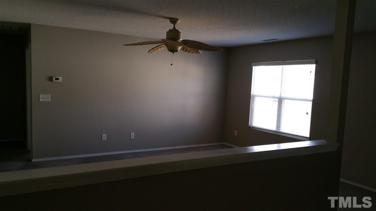 1004 Naylor Road Knightdale, NC 27545 - Photo 11 of 20 a view of empty room with window