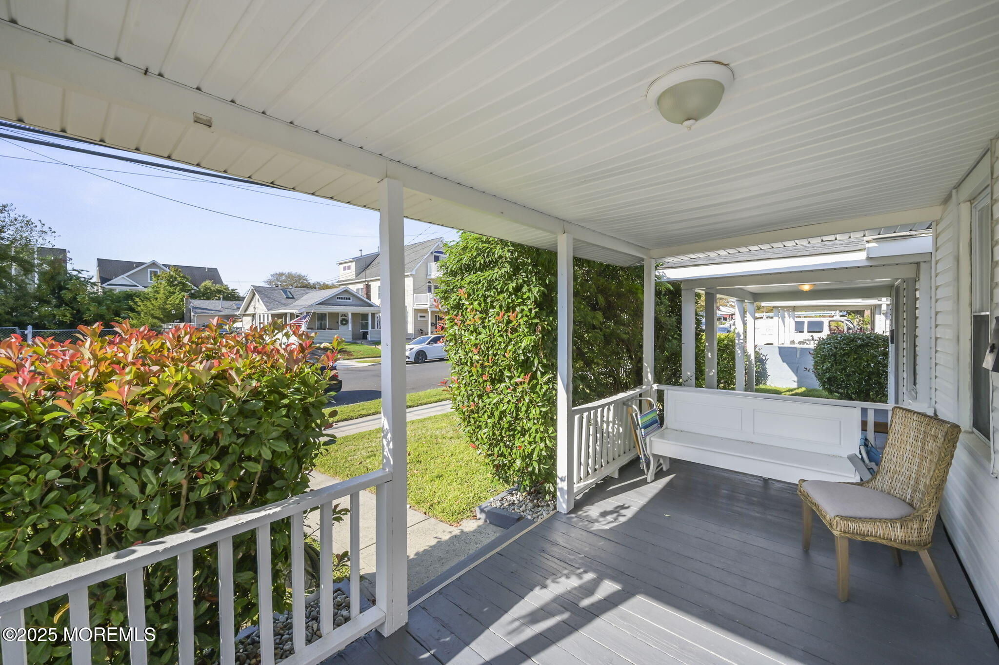 206 16th Avenue Belmar, NJ 07719 - Photo 4 of 20 a view of a porch with furniture and garden