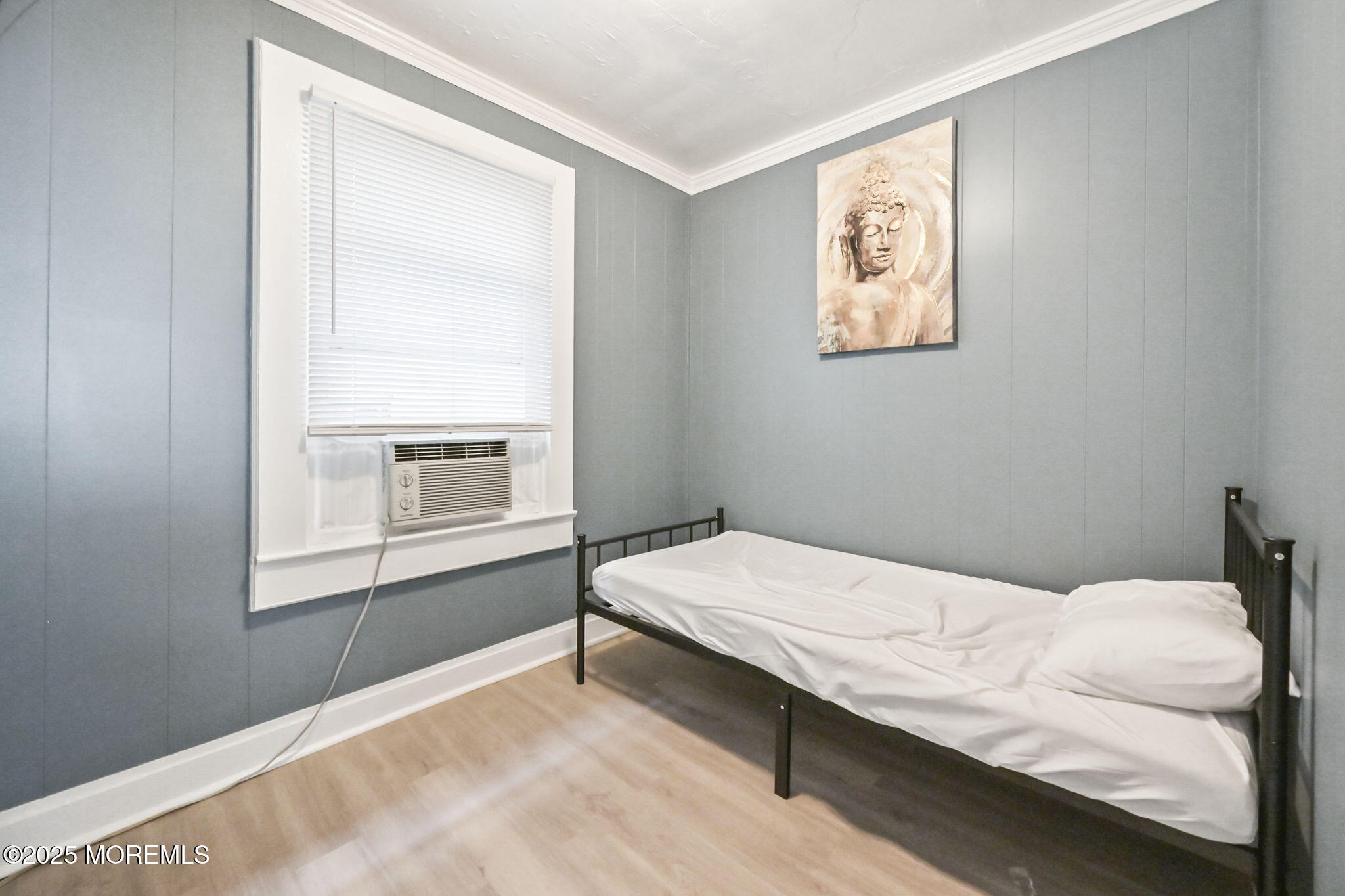 206 16th Avenue Belmar, NJ 07719 - Photo 6 of 20 a bedroom with a bed and a window