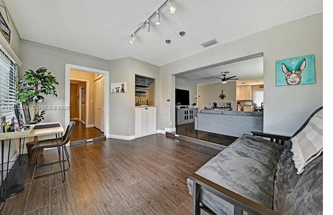 945 Sunset Road, Unit 1 West Palm Beach, FL 33401 - Photo 5 of 20 a living room with furniture and wooden floor