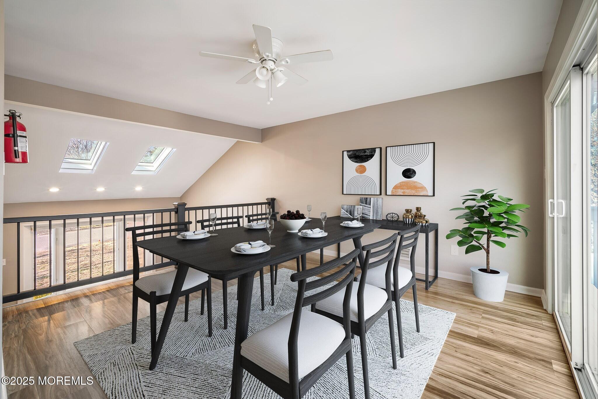 12 6th Street Barnegat, NJ 08005 - Photo 4 of 31 a view of a dining room with furniture and wooden floor