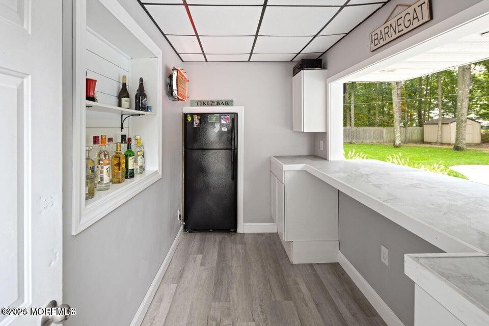 12 6th Street Barnegat, NJ 08005 - Photo 10 of 31 a kitchen with refrigerator and window