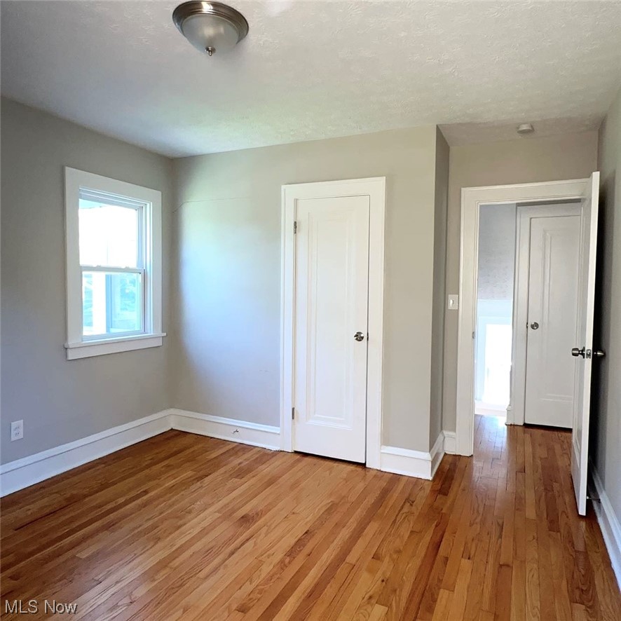 1055 Hillstone Road Cleveland Heights, OH 44121 - Photo 8 of 16 Unfurnished room featuring light hardwood floors