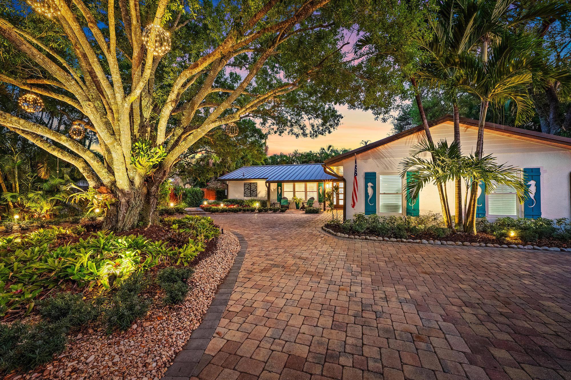 104 Elsa Road Jupiter, FL 33477 - Photo 21 of 33 Front Exterior
