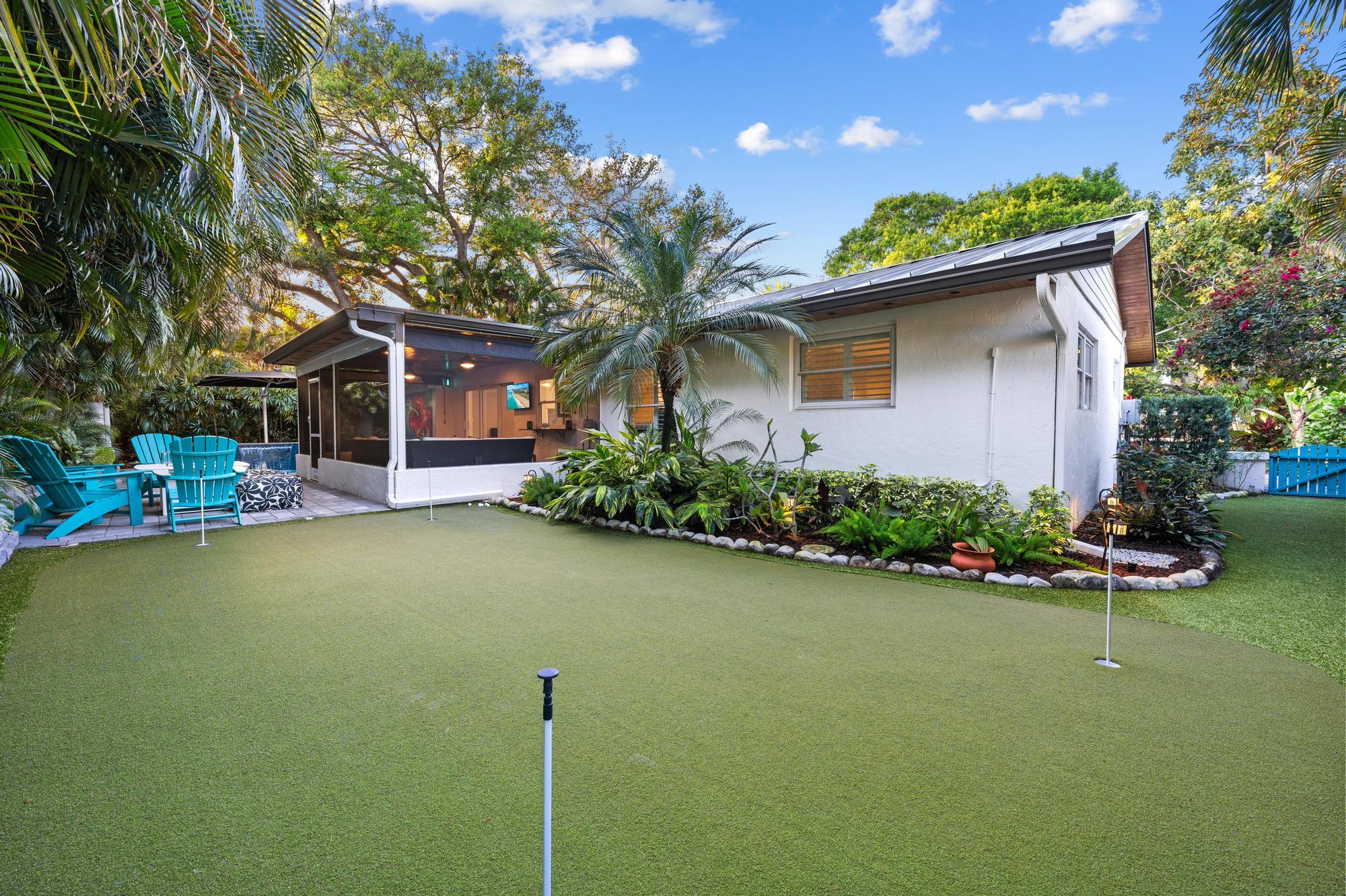 104 Elsa Road Jupiter, FL 33477 - Photo 32 of 33 Golf & Back Exterior