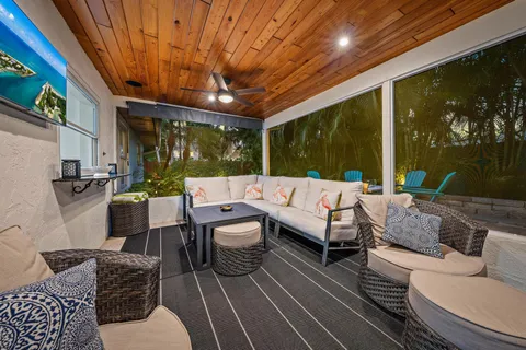a outdoor space with patio couch and outdoor view