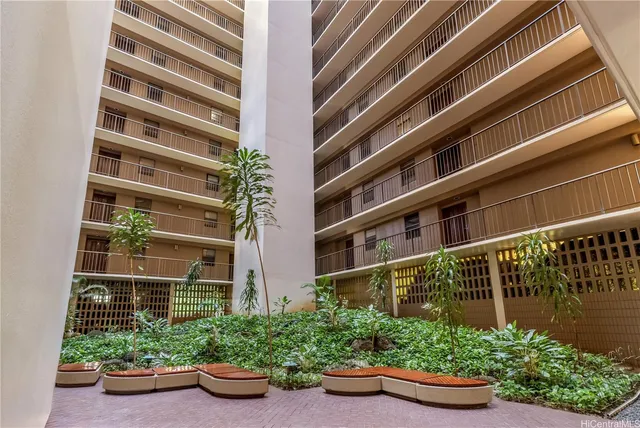 a view of a garden with potted plants