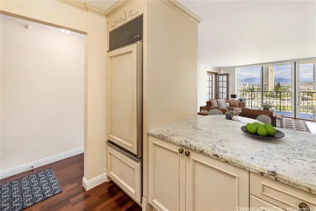 a kitchen with sink refrigerator and window