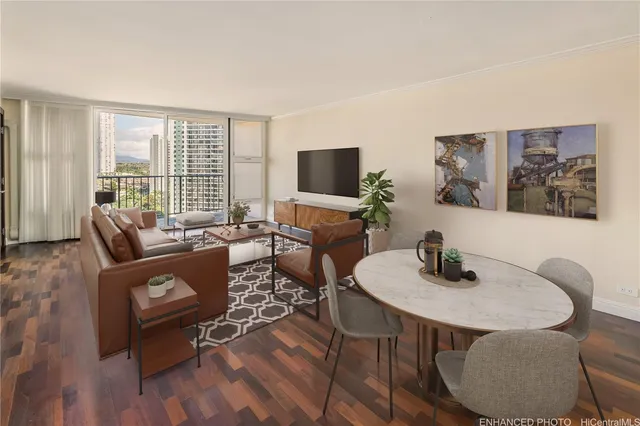 a living room with furniture and a flat screen tv