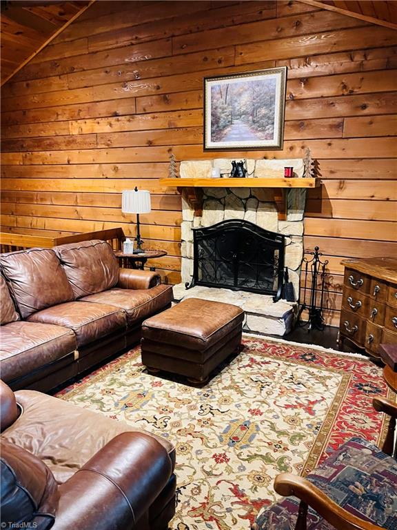 850 Holleridge Road Ferguson, NC 28624 - Photo 4 of 18 Living Room with rock fireplace