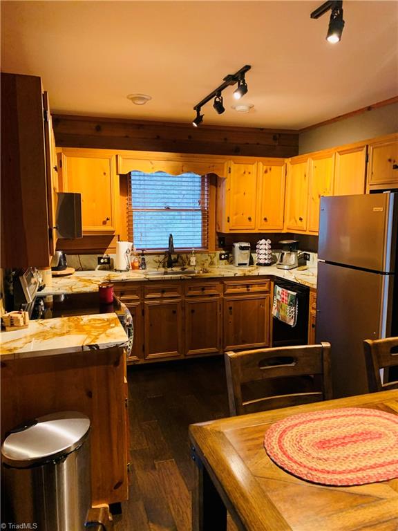 850 Holleridge Road Ferguson, NC 28624 - Photo 5 of 18 Kitchen view from the Living Room. Beautiful granite counter tops