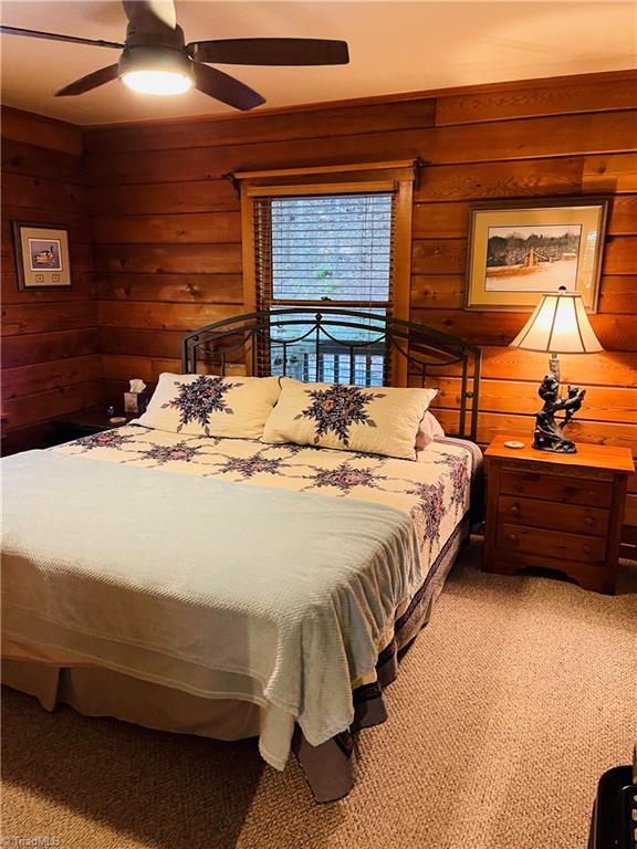 850 Holleridge Road Ferguson, NC 28624 - Photo 6 of 18 Primary bedroom on the main level