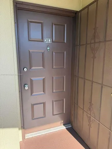 a view of balcony with wooden floor and stairs