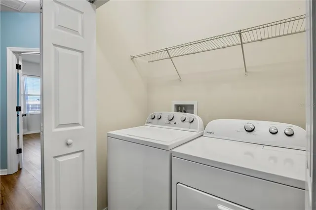 a utility room with dryer and washer