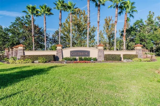a view of house with outdoor space and seating area