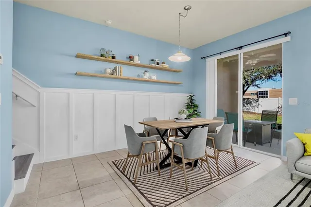 a view of a dining room with furniture