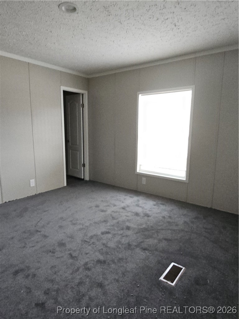 1438 Twisted Hickory Road Elizabethtown, NC 28337 - Photo 13 of 15 a view of an empty room with a window