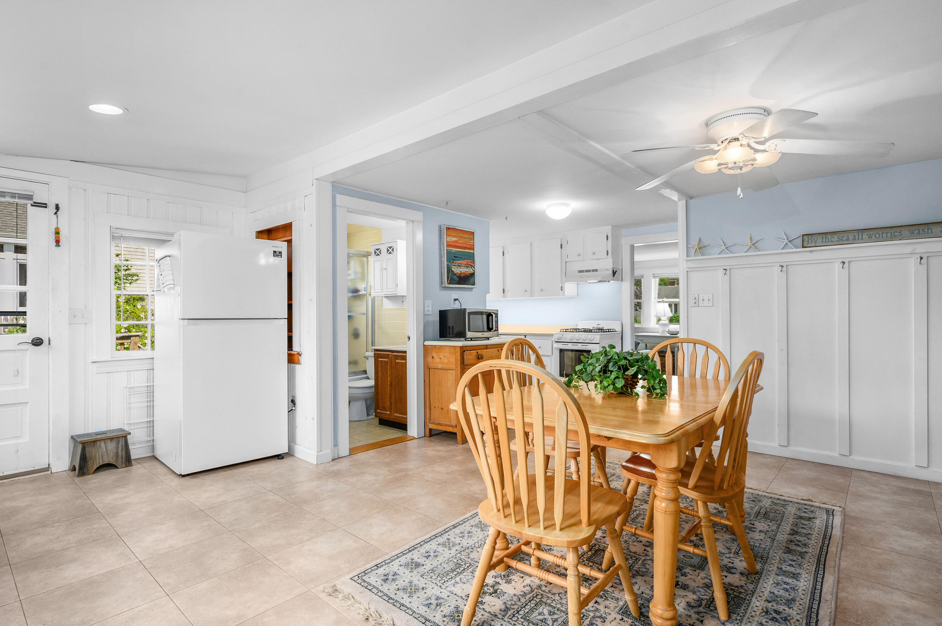 25 Pine Cone Drive West Yarmouth, MA 02673 - Photo 11 of 34 a view of a dining room with furniture
