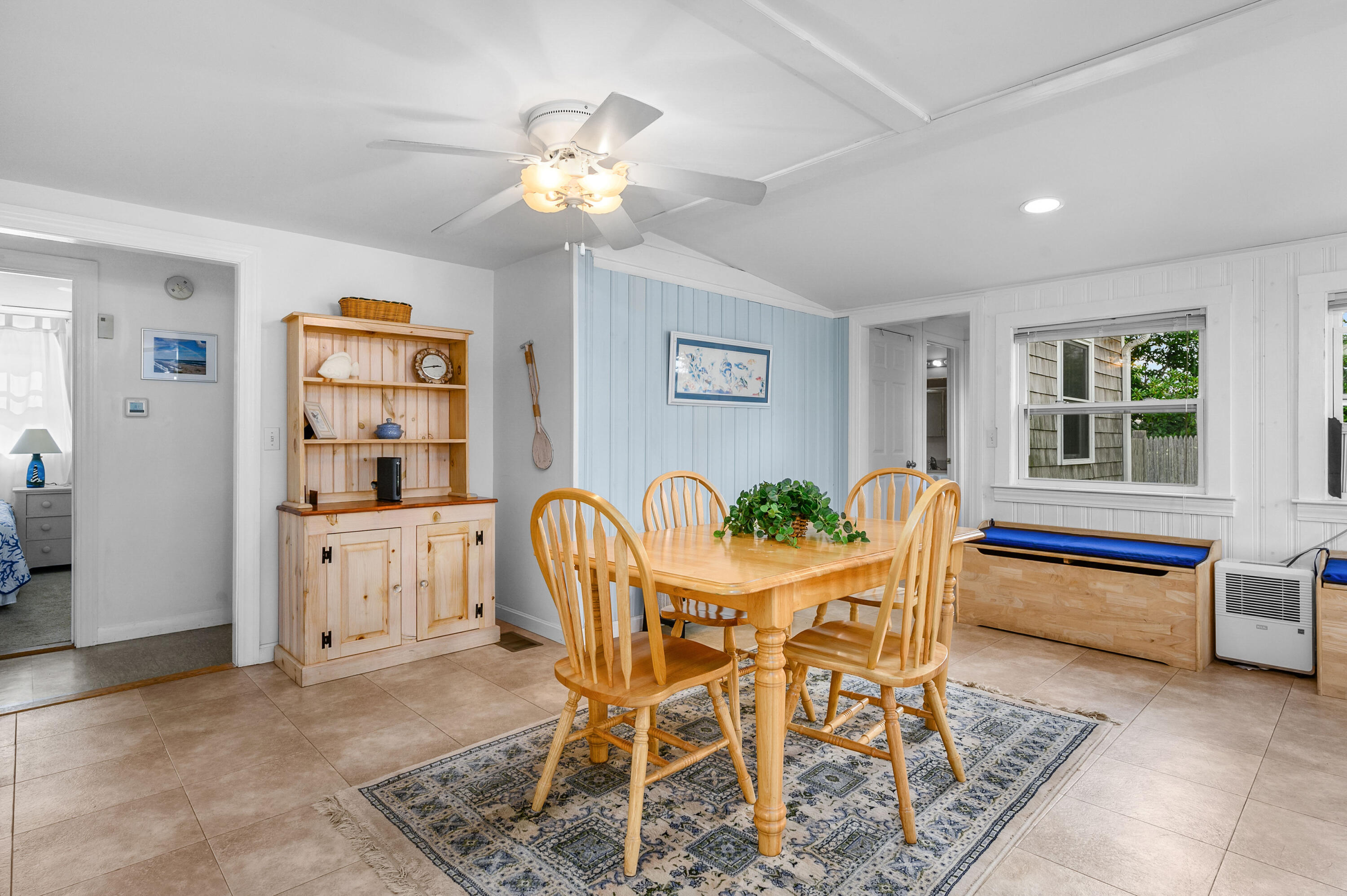25 Pine Cone Drive West Yarmouth, MA 02673 - Photo 12 of 34 a view of a dining room with furniture and chandelier