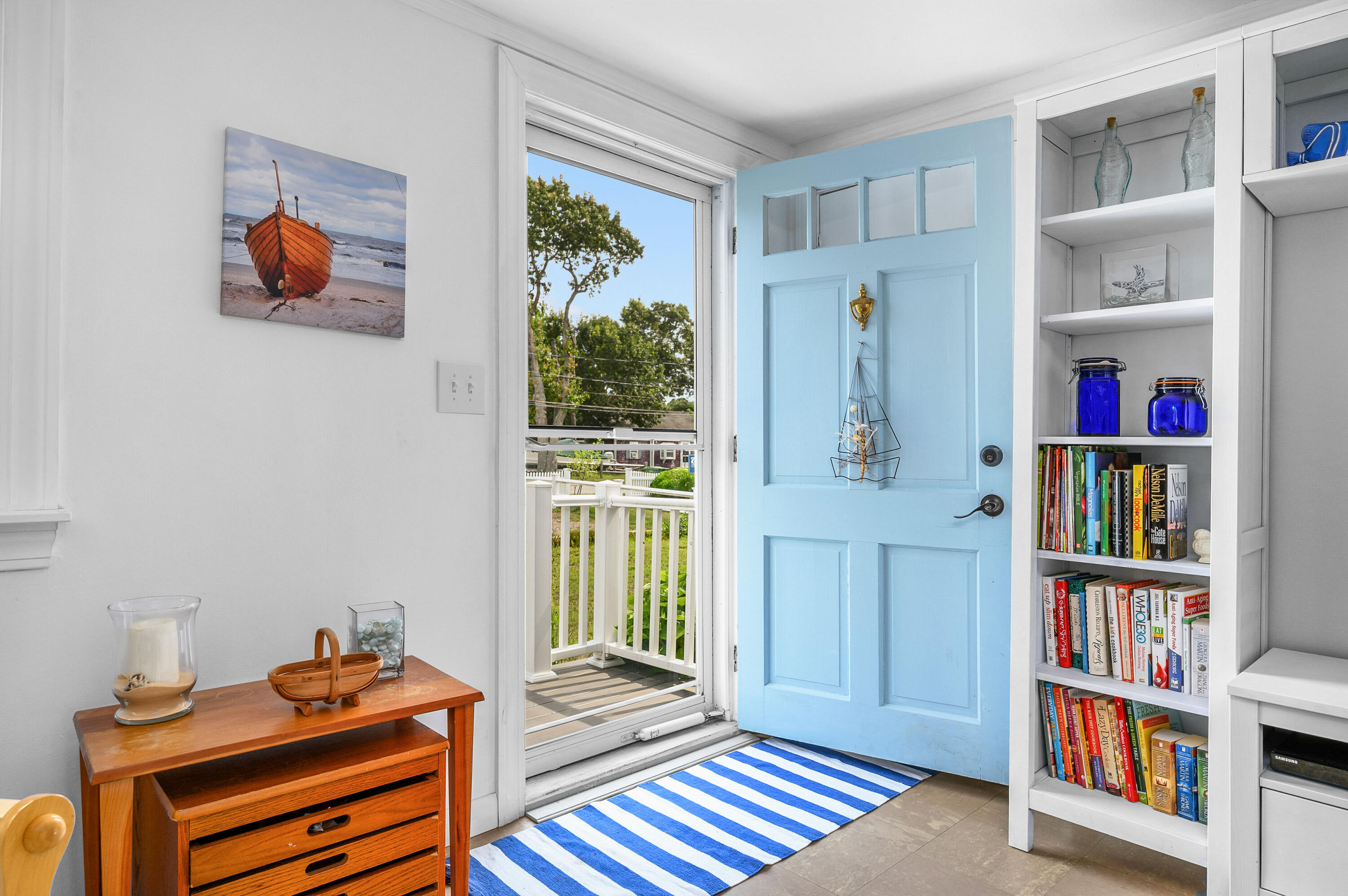 25 Pine Cone Drive West Yarmouth, MA 02673 - Photo 4 of 34 a room with furniture and a book shelf