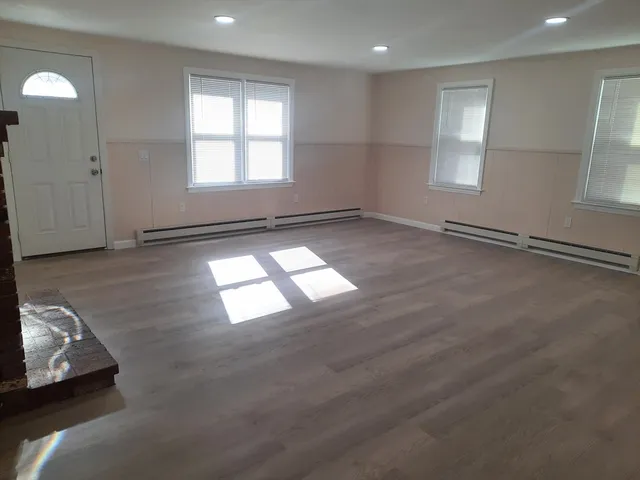 an empty room with windows