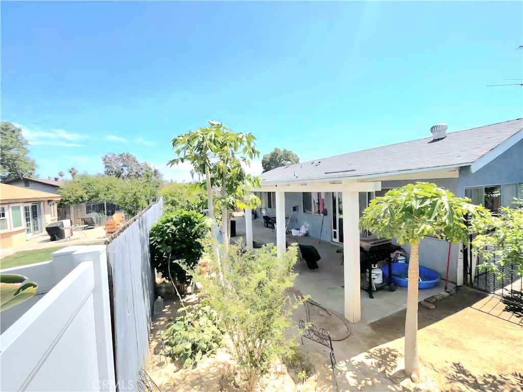 4267 Baggett Drive Riverside, CA 92505 - Photo 13 of 28 a front view of a house with a yard