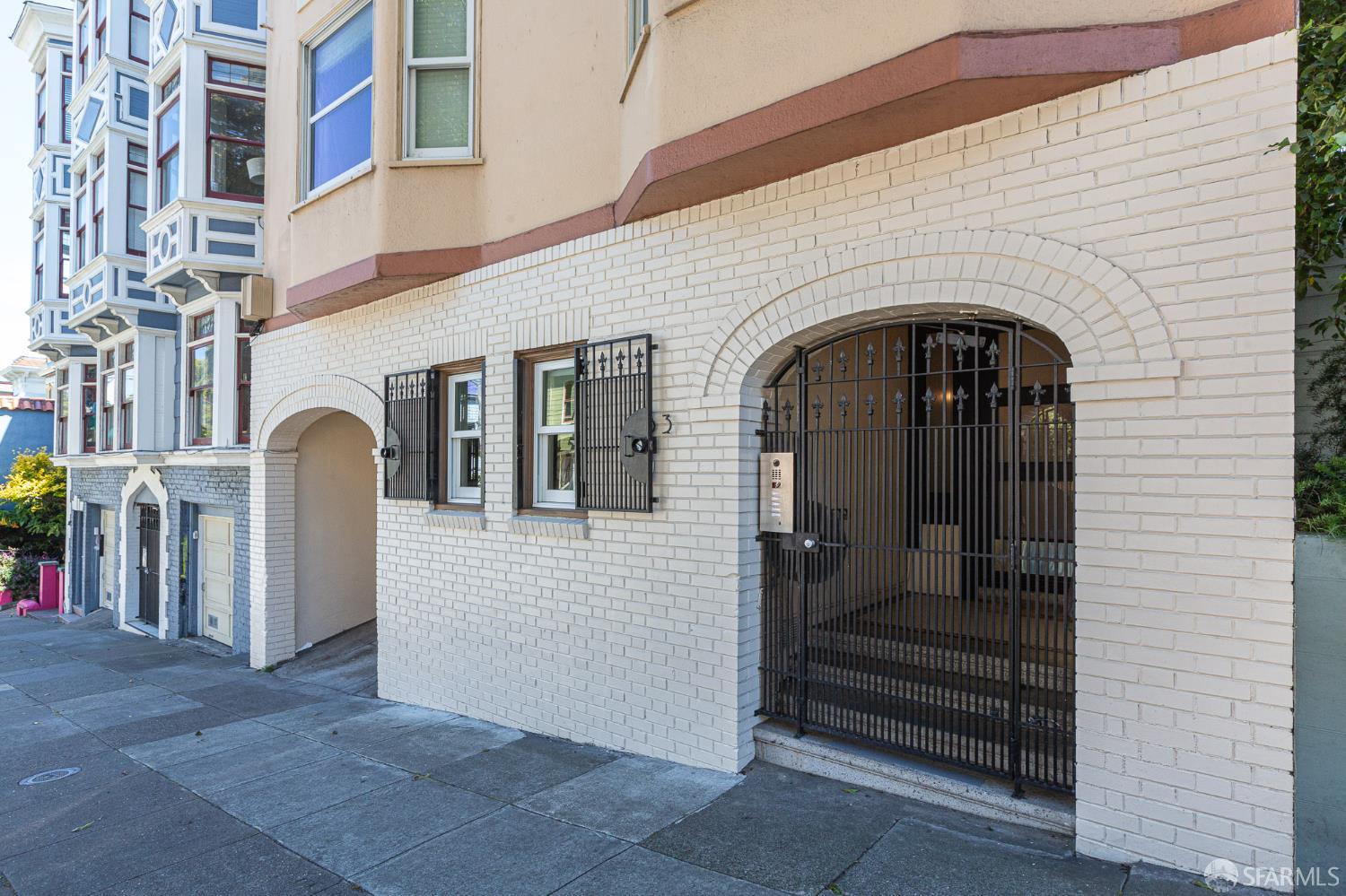 863 Haight Street, Unit 5 San Francisco, CA 94117 - Photo 2 of 16 a view of a brick house with large windows