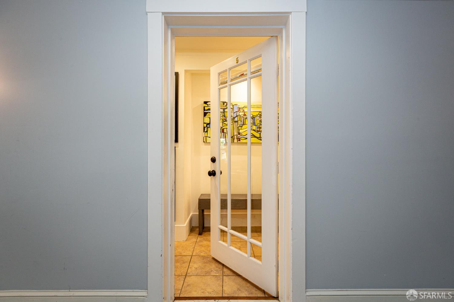 863 Haight Street, Unit 5 San Francisco, CA 94117 - Photo 3 of 16 a view of a glass door with a glass door