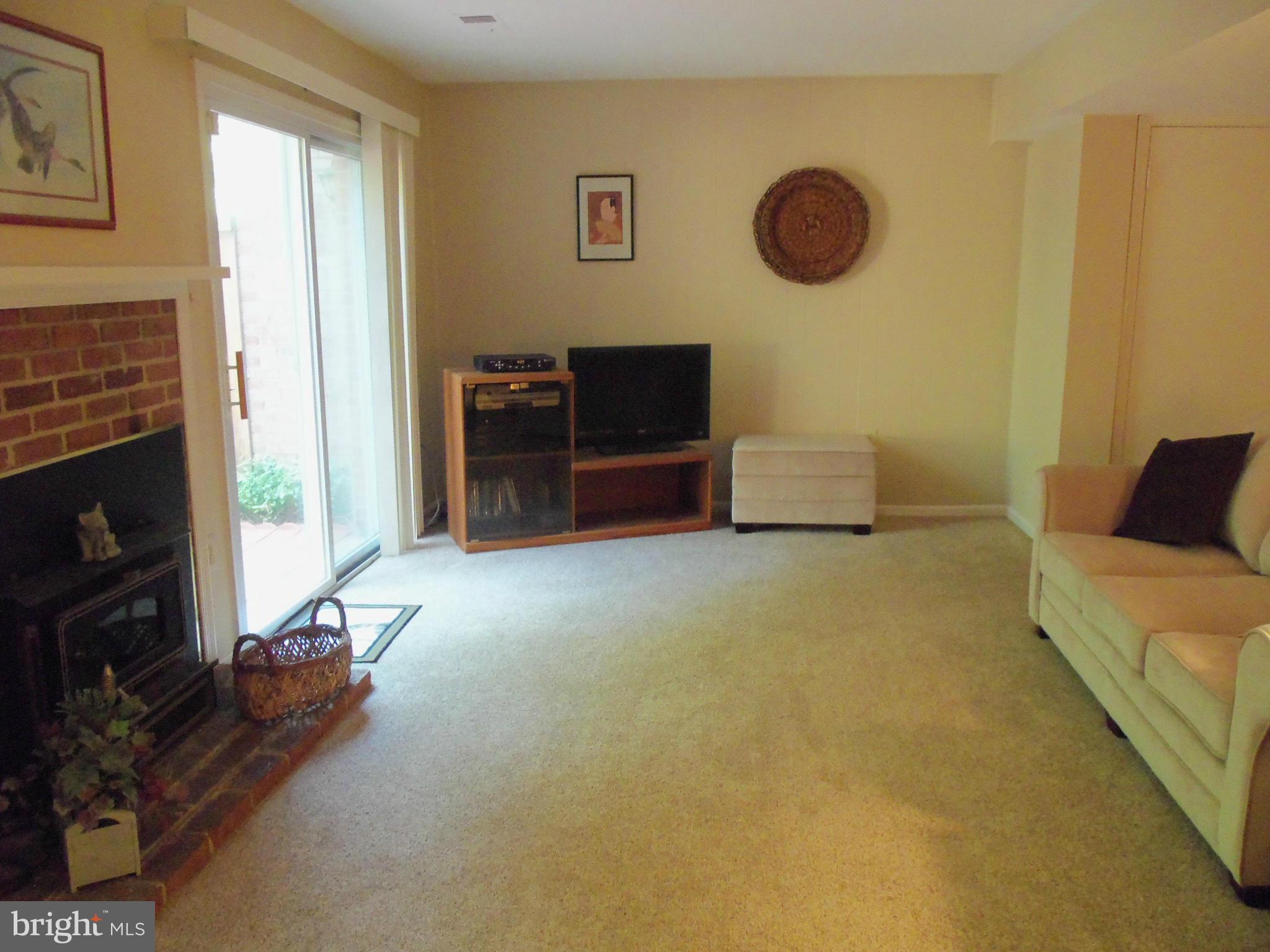 8112 Sleepy View Lane Springfield, VA 22153 - Photo 24 of 30 REC ROOM WITH WOOD BURNING STOVE